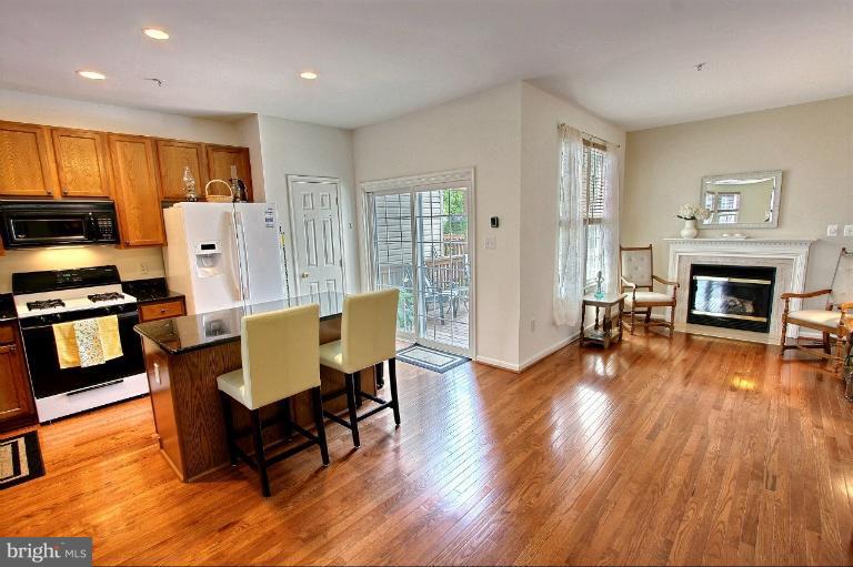 18202 Coachmans Road Germantown, MD 20874 - Photo 15 of 28 Kitchen and Family Room view