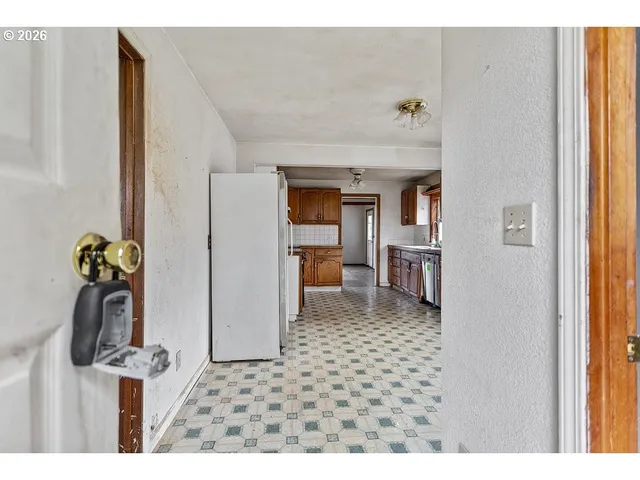 a bathroom with a shower sink and mirror