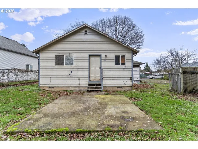 a backyard of a house with lots of green space
