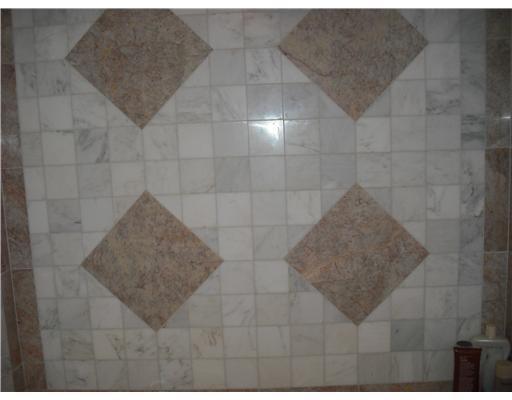 413 Windsor Road Augusta, ME 04330 - Photo 10 of 25 Bathroom. Marble tile shower and tub...