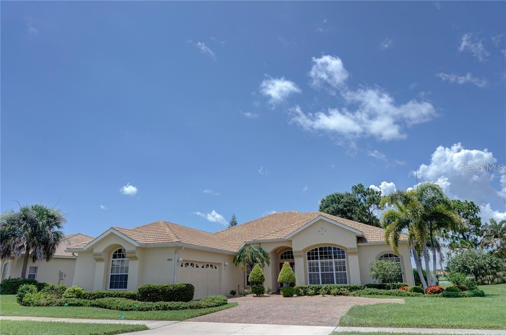 1005 Grouse Way Venice, FL 34285 - Photo 1 of 1 a front view of a house with garden