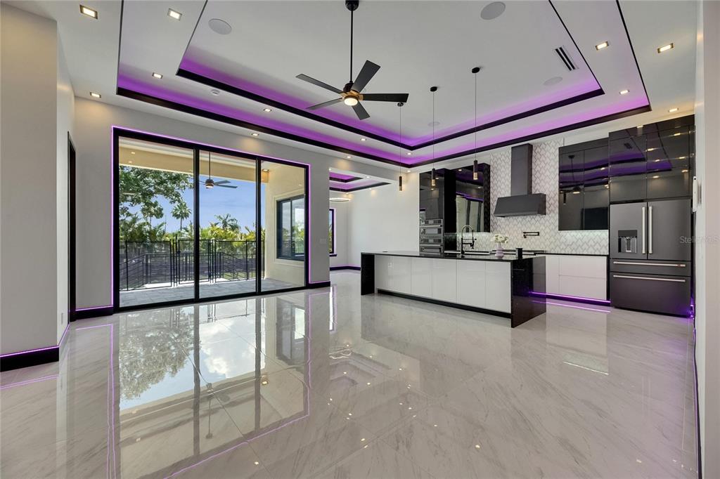 6532 Simone Shores Circle Apollo Beach, FL 33572 - Photo 23 of 86 a view of a kitchen and refrigerator in a kitchen