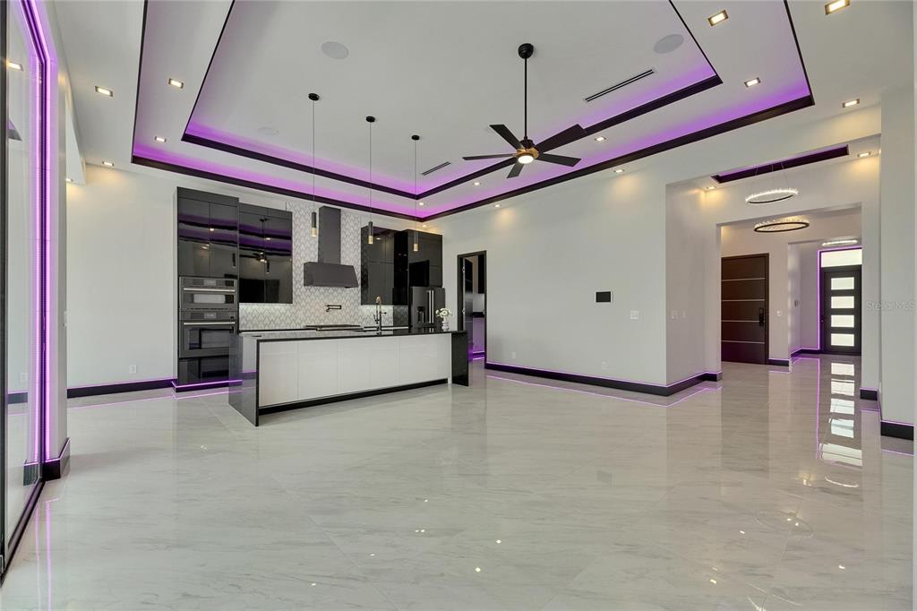6532 Simone Shores Circle Apollo Beach, FL 33572 - Photo 24 of 86 a view of living room with furniture and flat screen tv