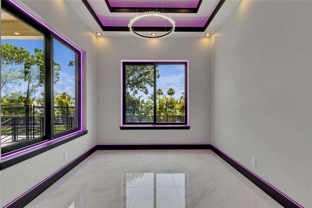 6532 Simone Shores Circle Apollo Beach, FL 33572 - Photo 30 of 86 a view of an empty room with windows