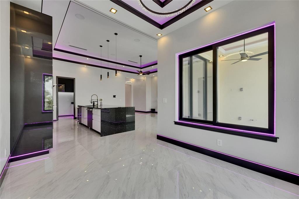 6532 Simone Shores Circle Apollo Beach, FL 33572 - Photo 31 of 86 a view of a hallway with entryway and stairs