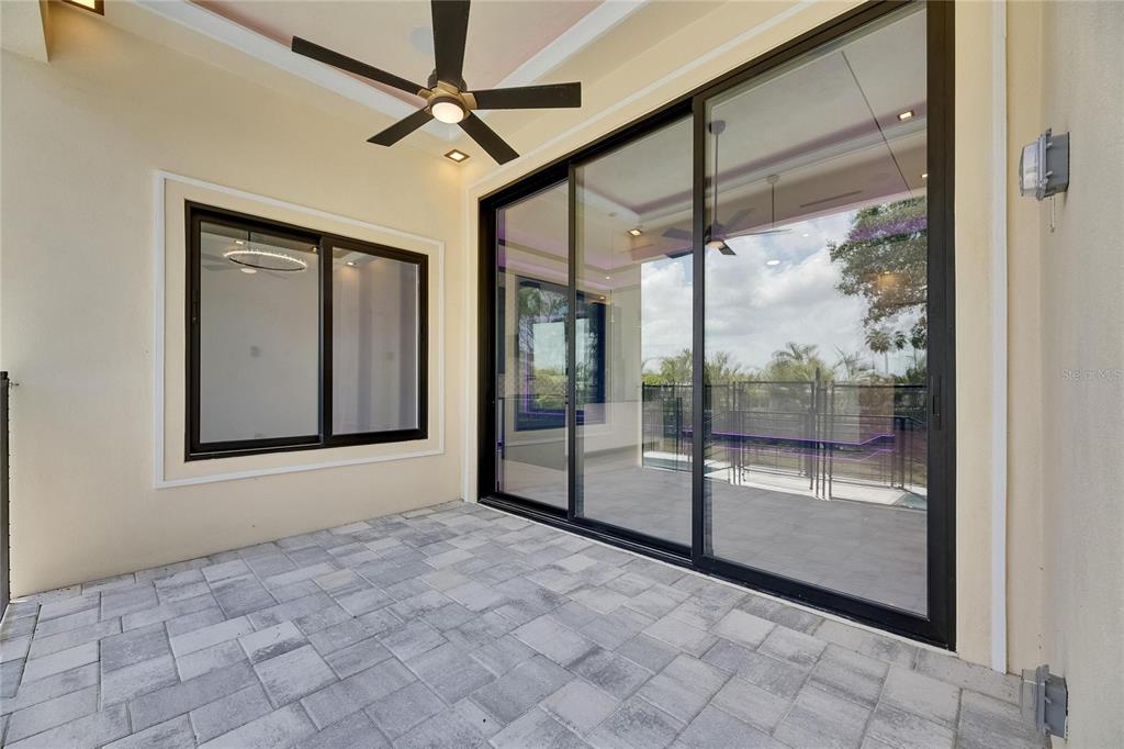 6532 Simone Shores Circle Apollo Beach, FL 33572 - Photo 55 of 86 a view of an empty room and window ceiling fan