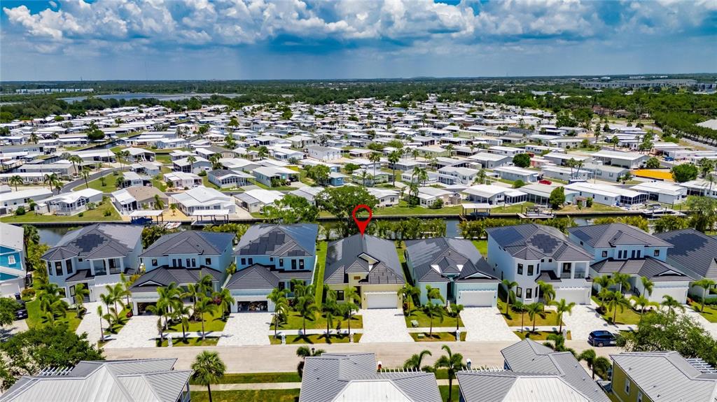 6532 Simone Shores Circle Apollo Beach, FL 33572 - Photo 76 of 86 an aerial view of residential houses with outdoor space