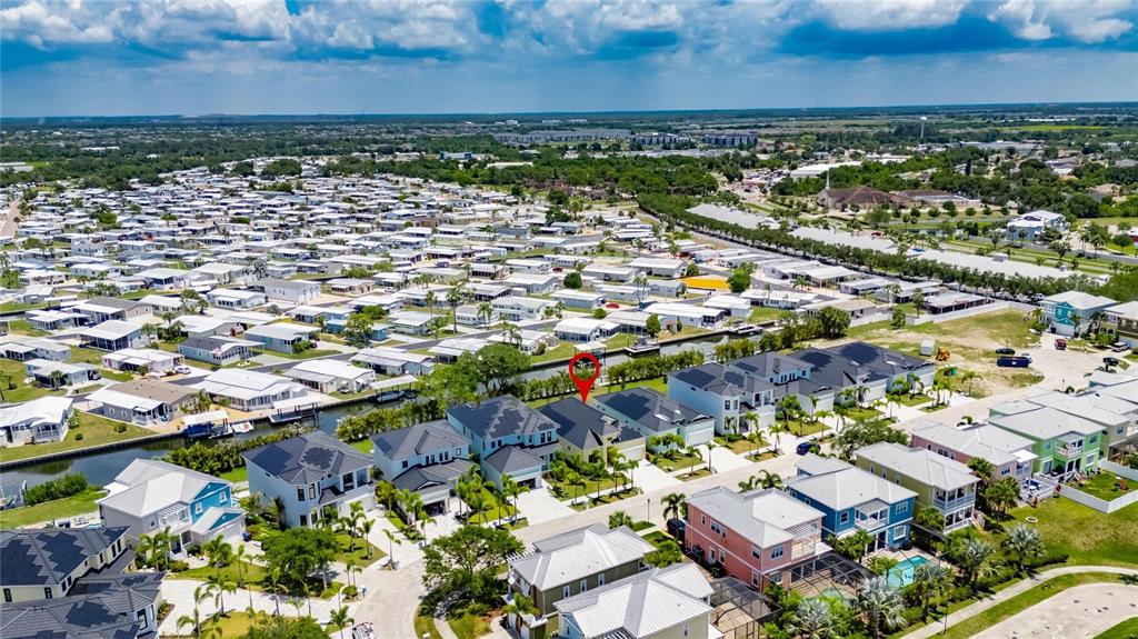 6532 Simone Shores Circle Apollo Beach, FL 33572 - Photo 78 of 86 an aerial view of residential building and lake