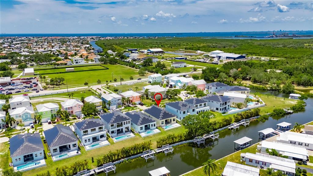 6532 Simone Shores Circle Apollo Beach, FL 33572 - Photo 81 of 86 a view of a city with lots of residential buildings and ocean view