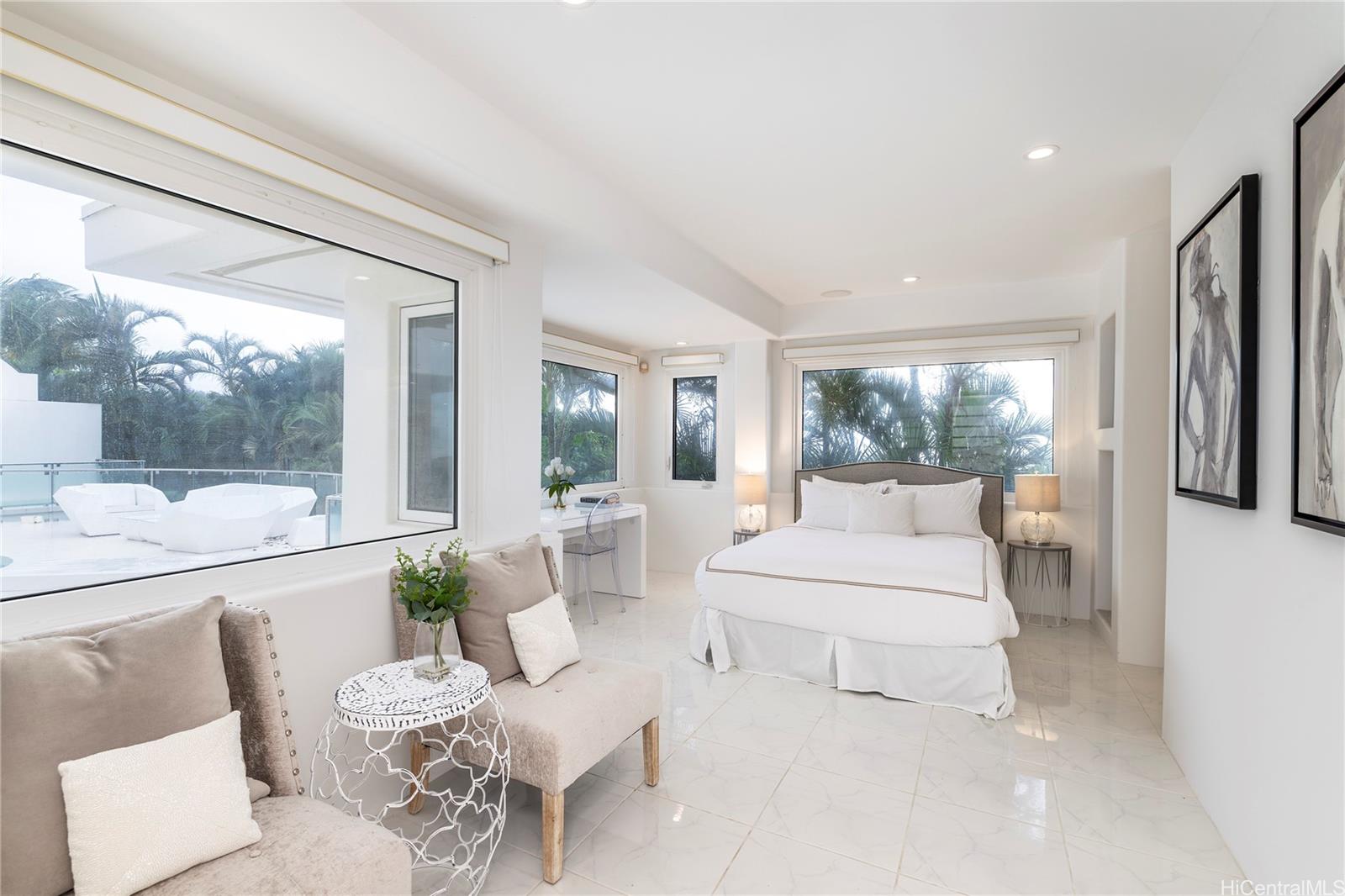 875 Ikena Circle Honolulu, HI 96821 - Photo 18 of 22 a living room with furniture and a large window