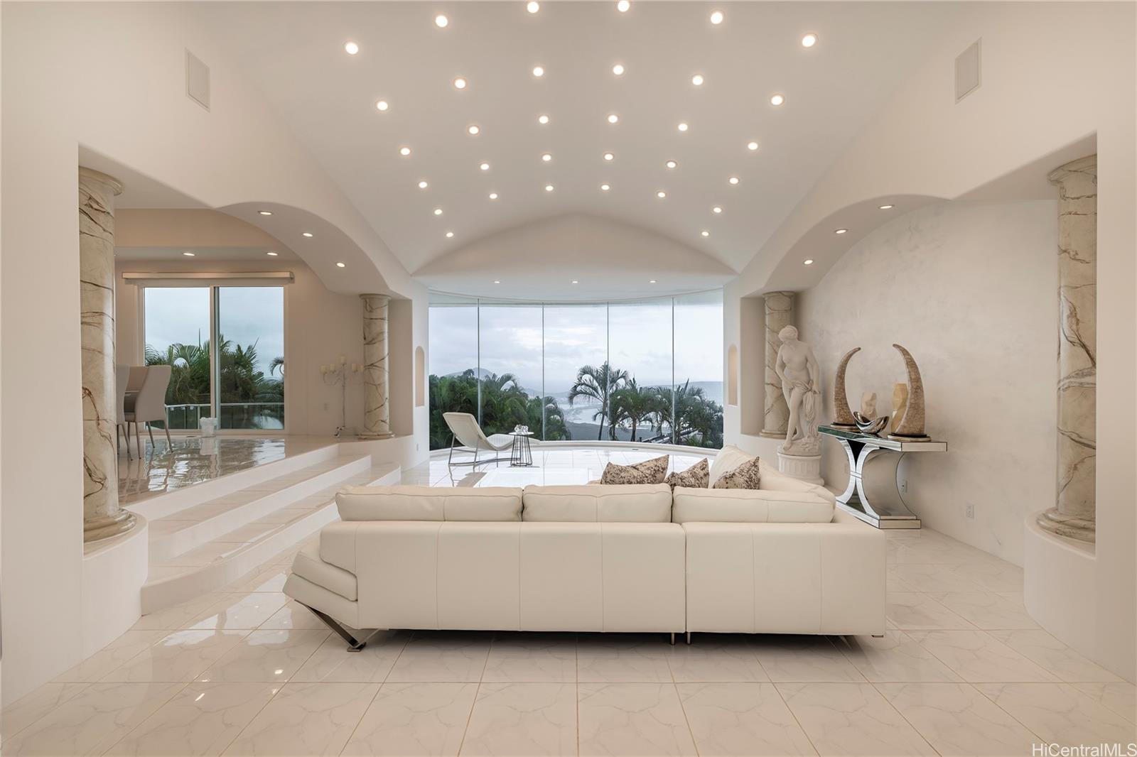 875 Ikena Circle Honolulu, HI 96821 - Photo 3 of 22 a living room with furniture and a potted plant