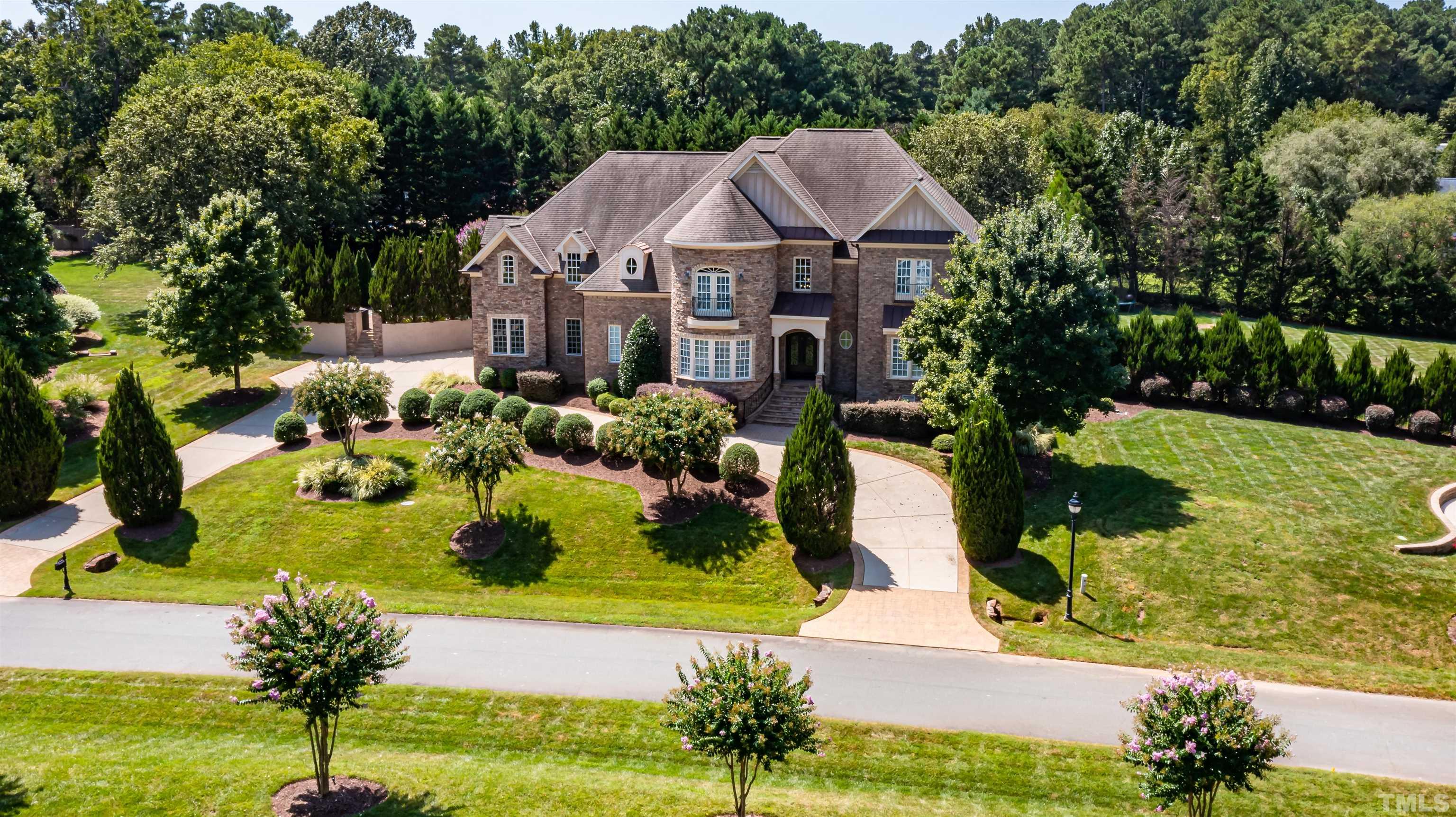9805 Najma Street Raleigh, NC 27613 - Photo 1 of 29 a aerial view of a house with a yard