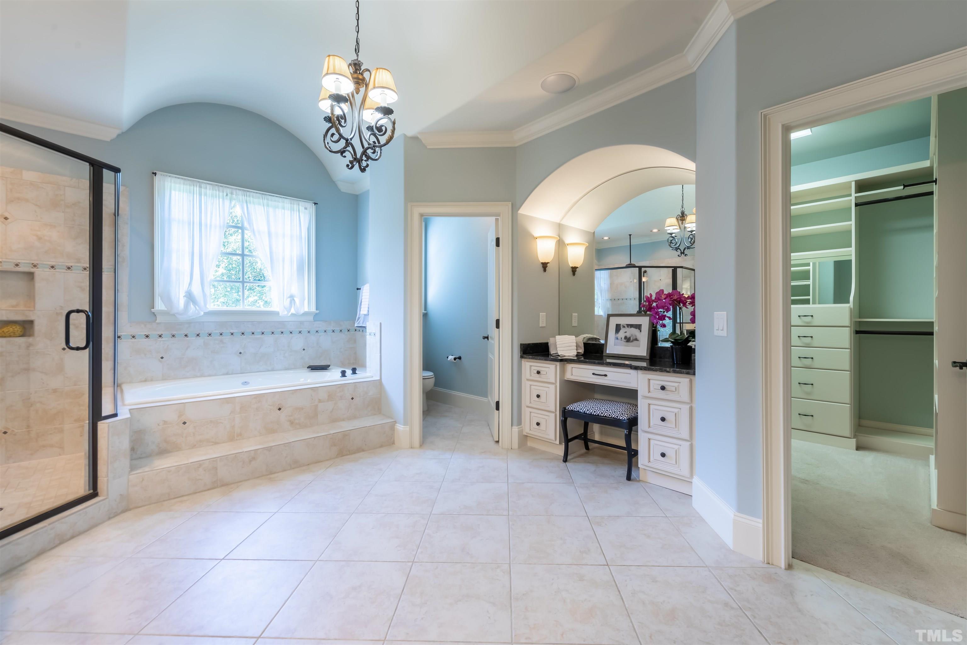9805 Najma Street Raleigh, NC 27613 - Photo 21 of 29 a view of living room and kitchen