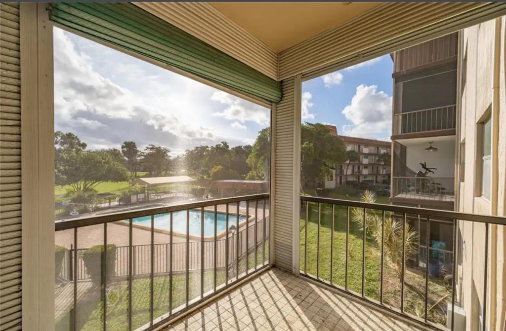 6100 South Falls Cir Drive, Unit 204 Lauderhill, FL 33319 - Photo 18 of 27 a view of a city from a balcony
