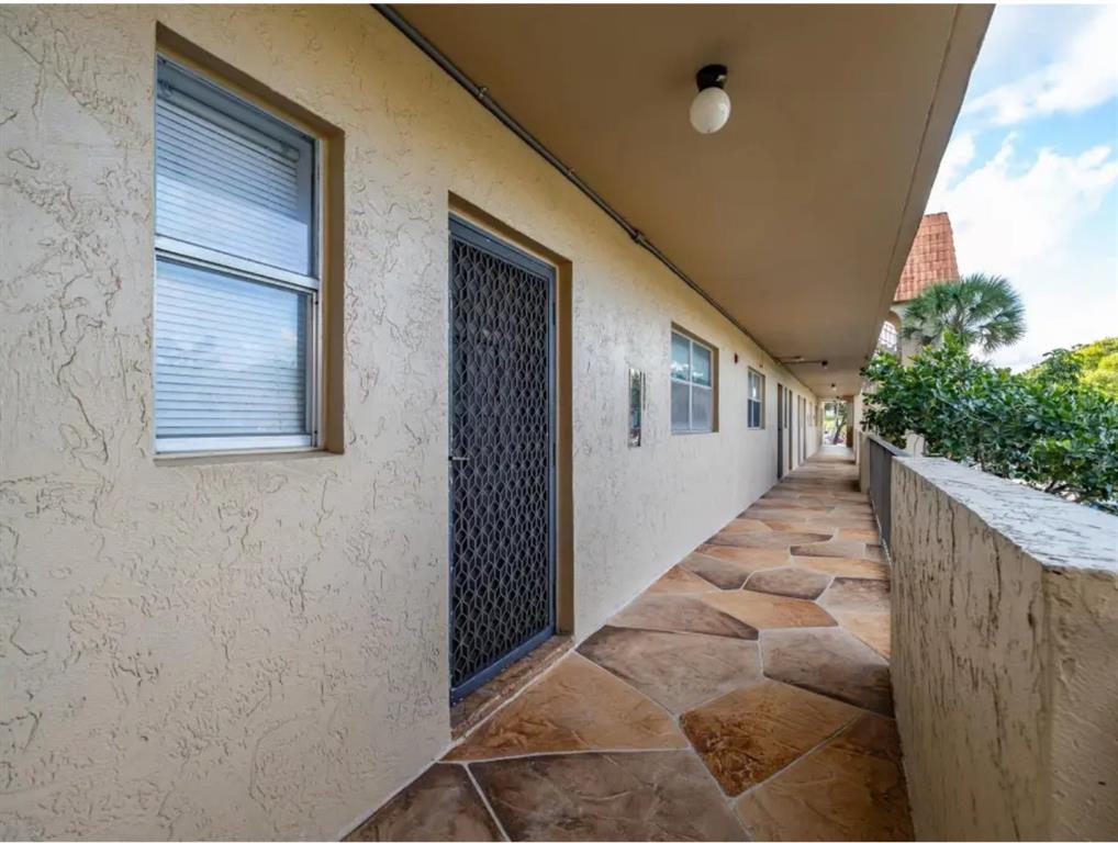 6100 South Falls Cir Drive, Unit 204 Lauderhill, FL 33319 - Photo 22 of 27 a view of a house with a backyard
