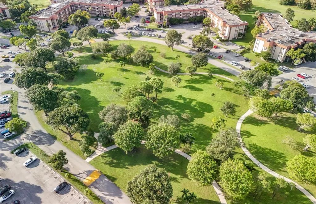 6100 South Falls Cir Drive, Unit 204 Lauderhill, FL 33319 - Photo 24 of 27 a view of a garden