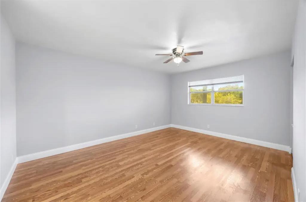 6100 South Falls Cir Drive, Unit 204 Lauderhill, FL 33319 - Photo 8 of 27 an empty room with a fan and a window