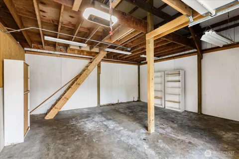 a kitchen with a refrigerator and a stove