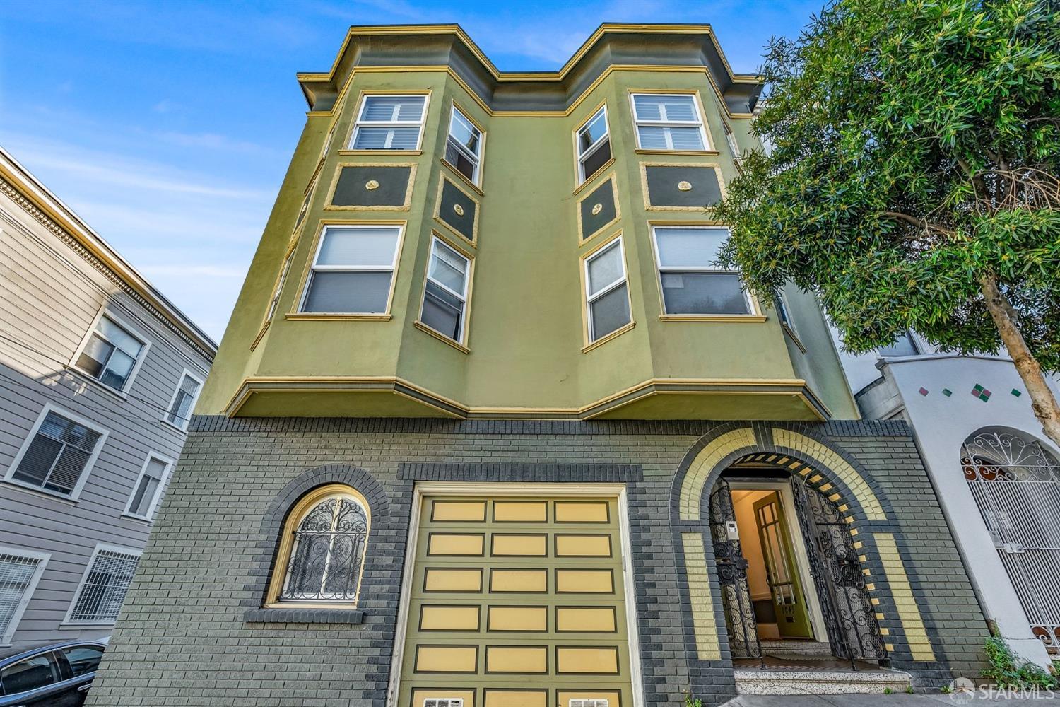 1049 Clay Street San Francisco, CA 94108 - Photo 23 of 28 a front view of a multi story residential apartment building