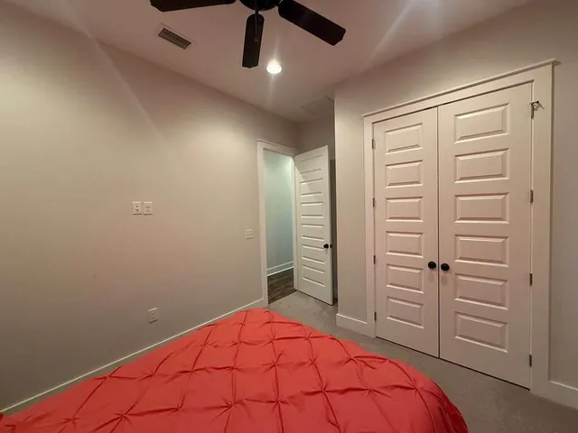 wooden floor and closet in a room