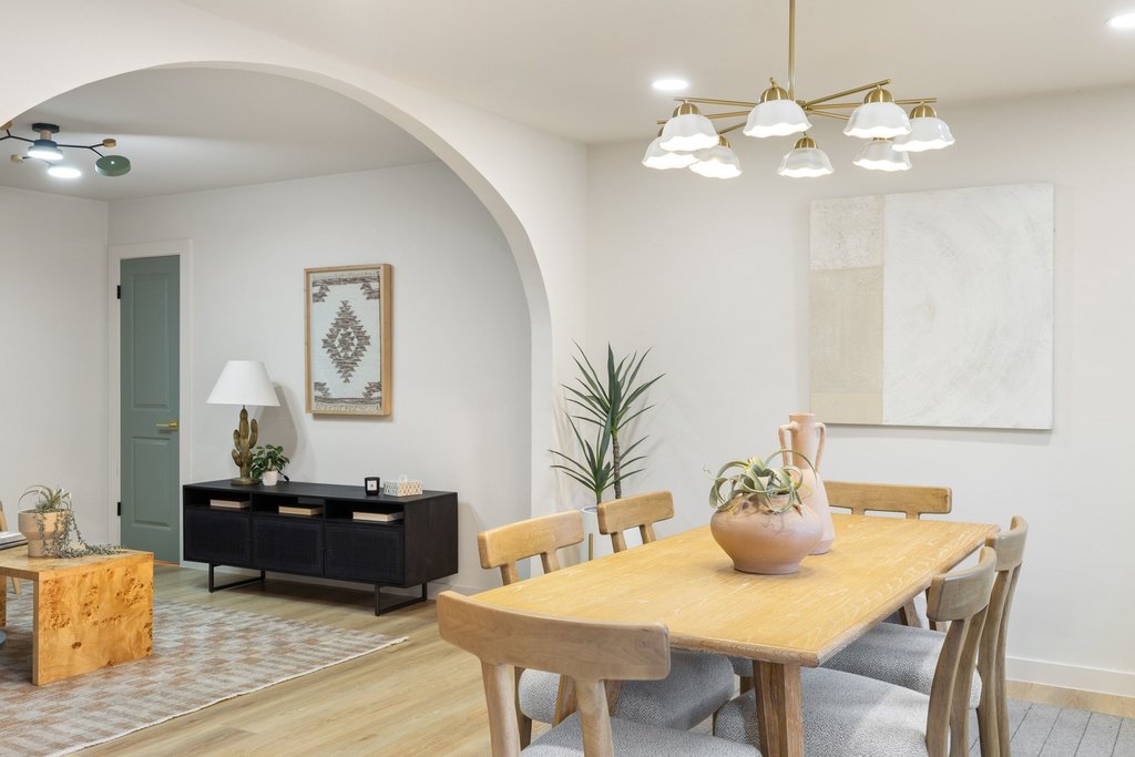7614 Watson Street Austin, TX 78757 - Photo 12 of 31 a view of a dining room with furniture and chandelier