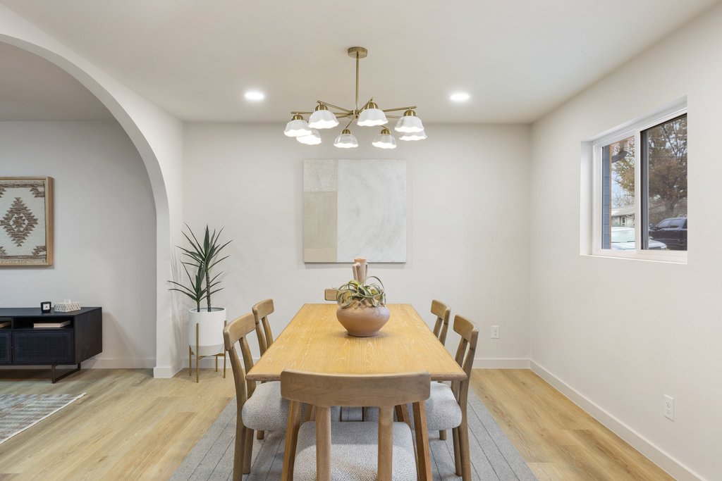 7614 Watson Street Austin, TX 78757 - Photo 13 of 31 a view of a dining room with a table and chairs