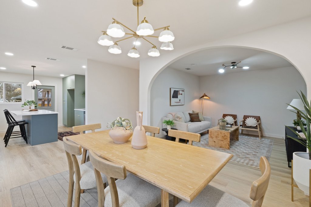 7614 Watson Street Austin, TX 78757 - Photo 15 of 31 a large kitchen with a table and chairs