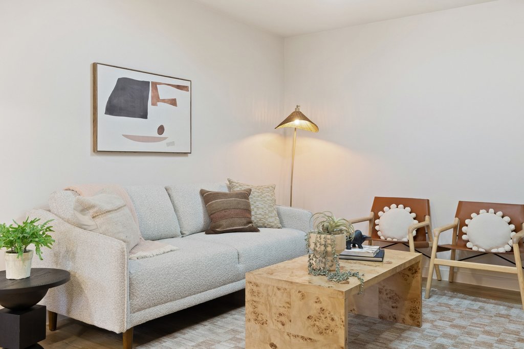 7614 Watson Street Austin, TX 78757 - Photo 5 of 31 a living room with furniture and a wooden floor