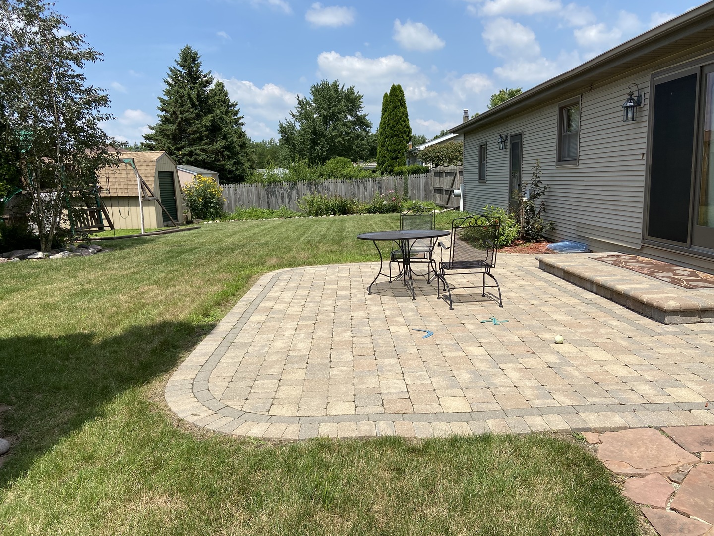 925 Knollside Road New Lenox, IL 60451 - Photo 24 of 32 a view of a house with backyard porch and sitting area