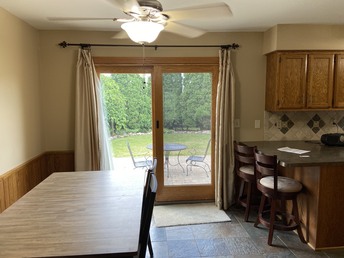 925 Knollside Road New Lenox, IL 60451 - Photo 9 of 32 a view of a dining room with furniture window and outside view