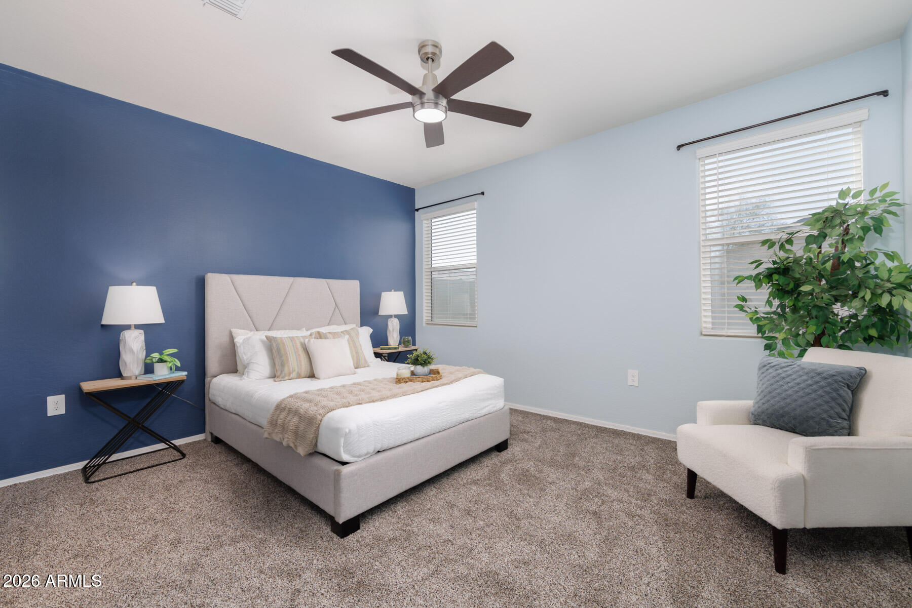 9381 Greenhouse Road Florence, AZ 85132 - Photo 12 of 35 a bedroom with a bed and a couch