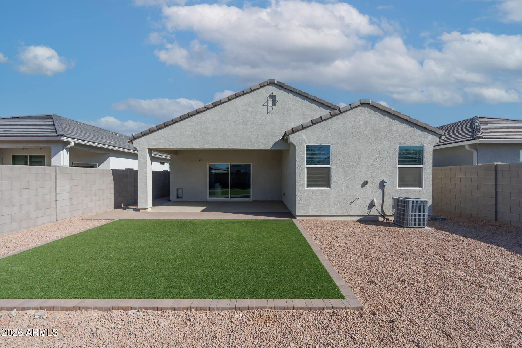 9381 Greenhouse Road Florence, AZ 85132 - Photo 25 of 35 a backyard of a house with table and chairs