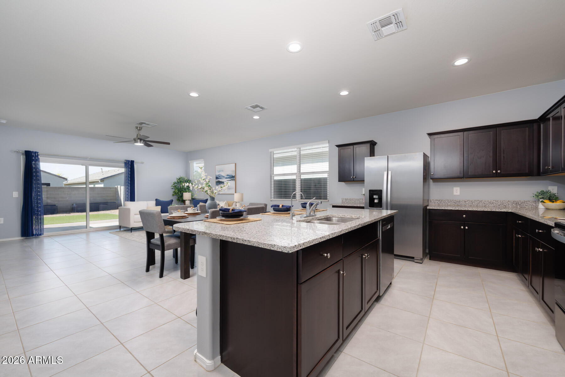 9381 Greenhouse Road Florence, AZ 85132 - Photo 2 of 35 a kitchen with a sink and cabinets
