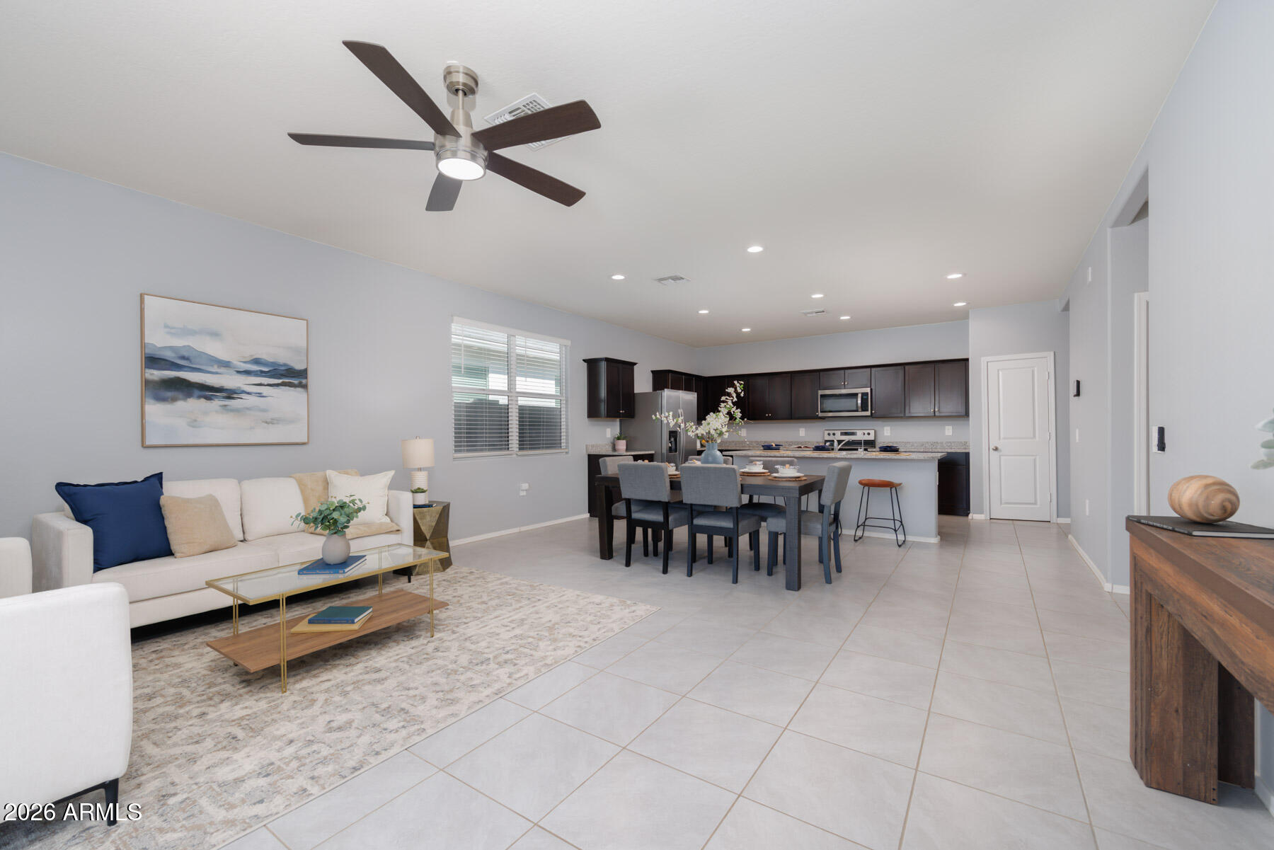 9381 Greenhouse Road Florence, AZ 85132 - Photo 8 of 35 a living room with furniture and kitchen view