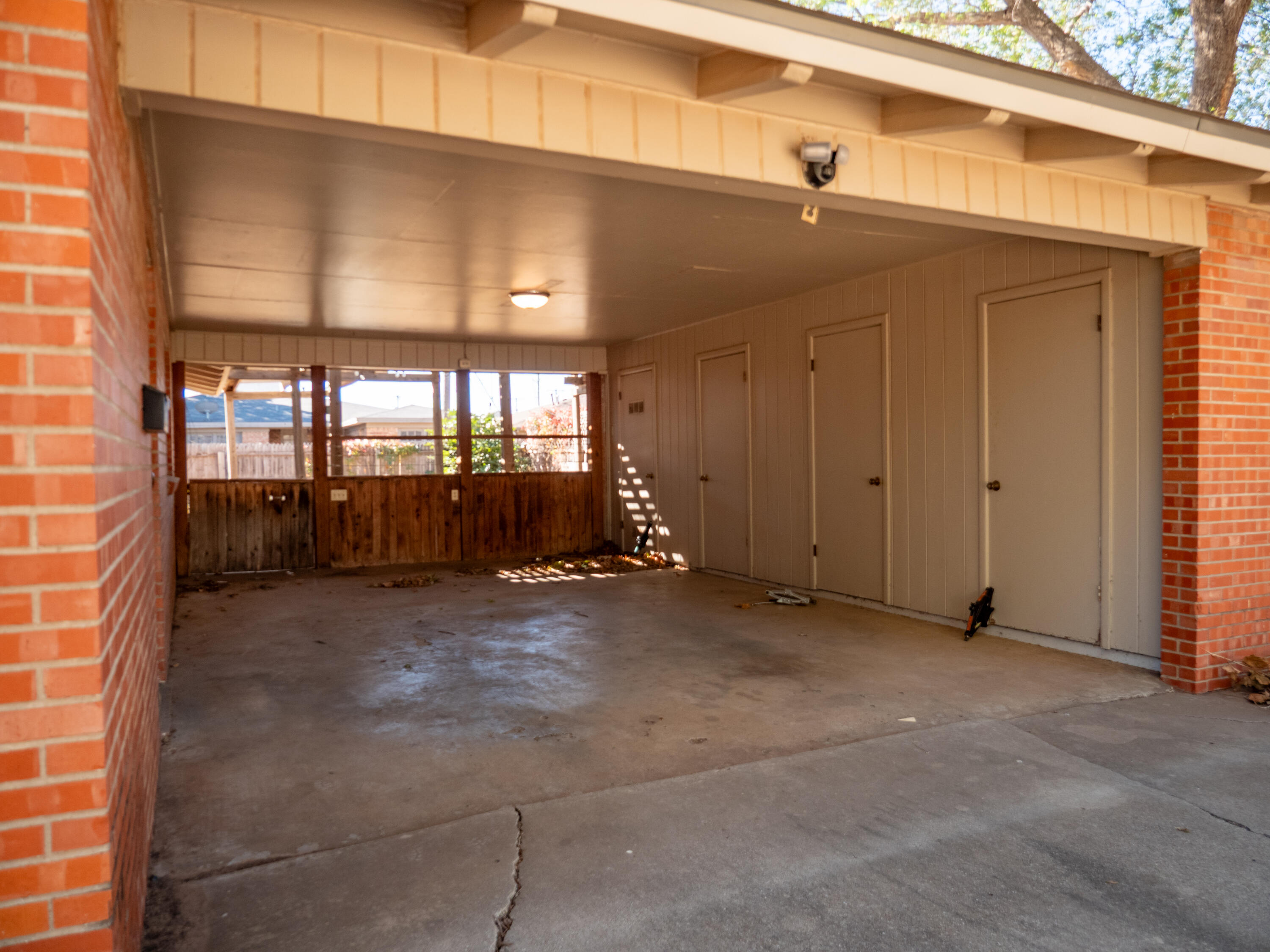 3415 48th Street Lubbock, TX 79413 - Photo 17 of 19 a view of a building with a garage