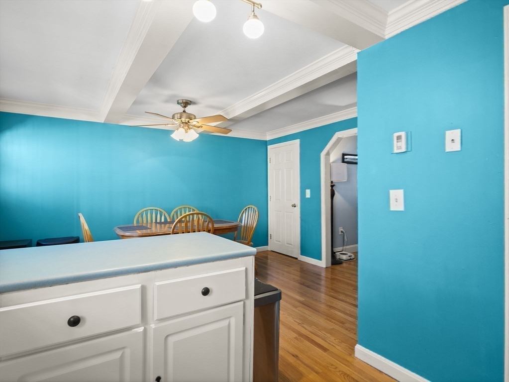 17 Cannongate Road, Unit 87 Tyngsborough, MA 01879 - Photo 13 of 39 a view of livingroom with hardwood floor and hallway