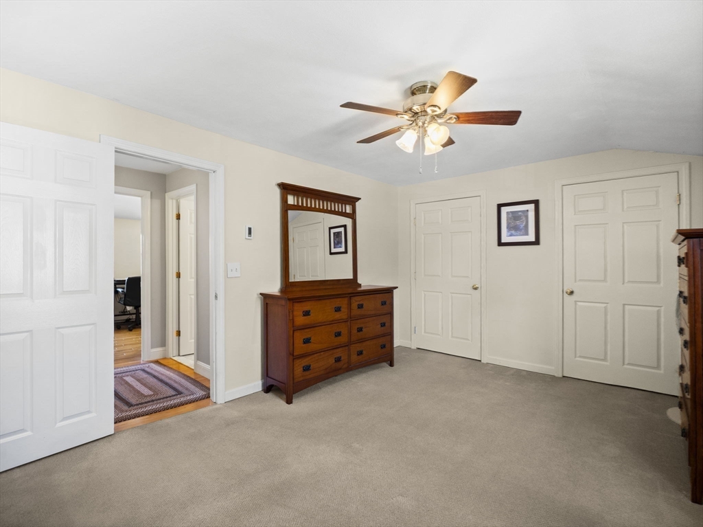 17 Cannongate Road, Unit 87 Tyngsborough, MA 01879 - Photo 20 of 39 a view of an empty room with window and cabinet