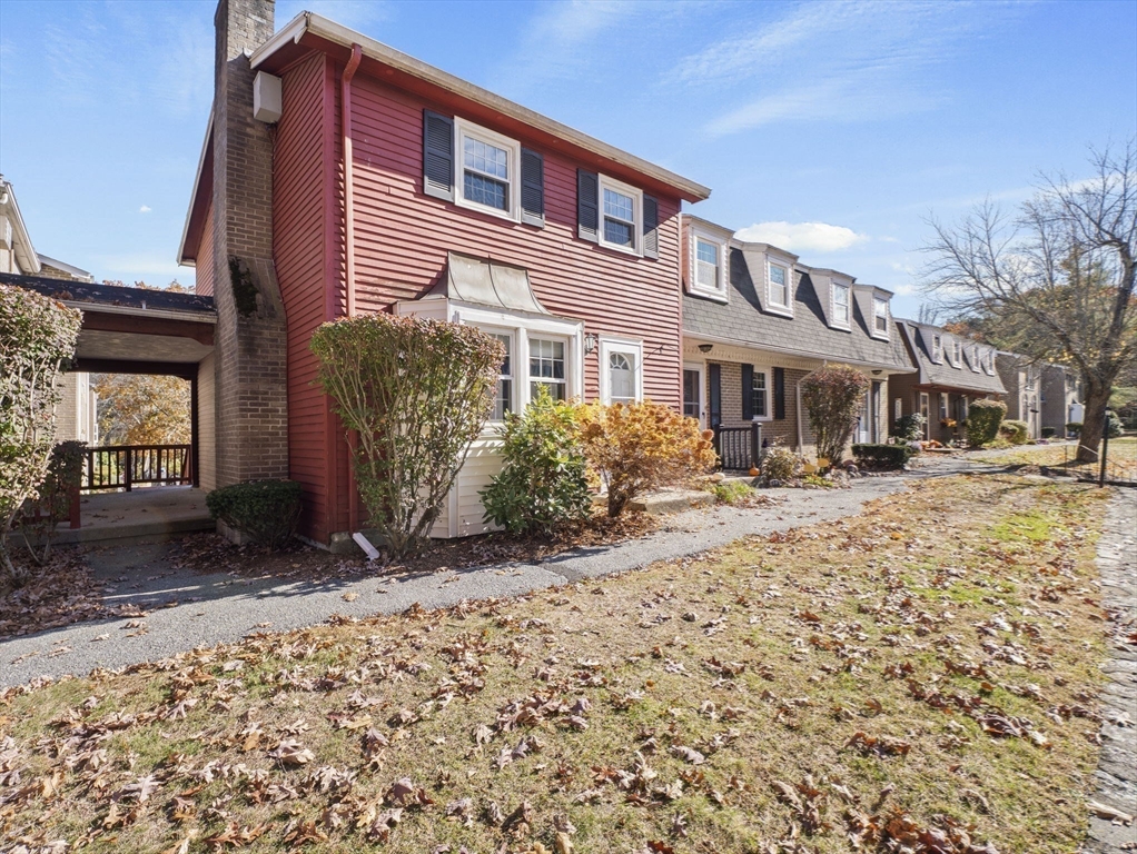 17 Cannongate Road, Unit 87 Tyngsborough, MA 01879 - Photo 2 of 39 a front view of a house with a yard