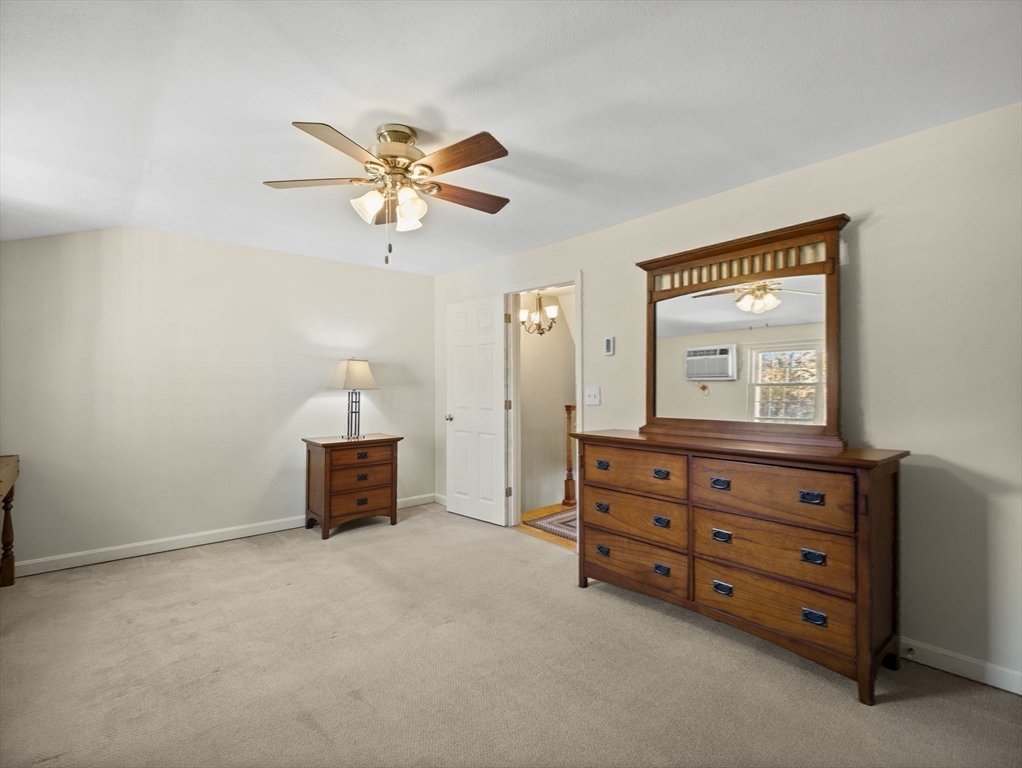 17 Cannongate Road, Unit 87 Tyngsborough, MA 01879 - Photo 22 of 39 a view of room with window and a ceiling fan