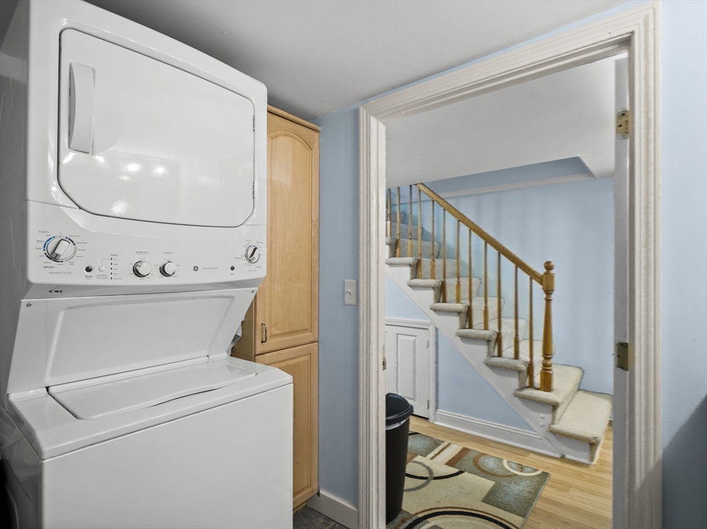 17 Cannongate Road, Unit 87 Tyngsborough, MA 01879 - Photo 23 of 39 a view of a livingroom with wooden floor and white walls