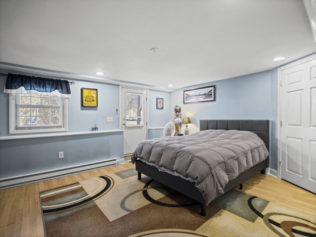 17 Cannongate Road, Unit 87 Tyngsborough, MA 01879 - Photo 28 of 39 a bedroom with a bed and window