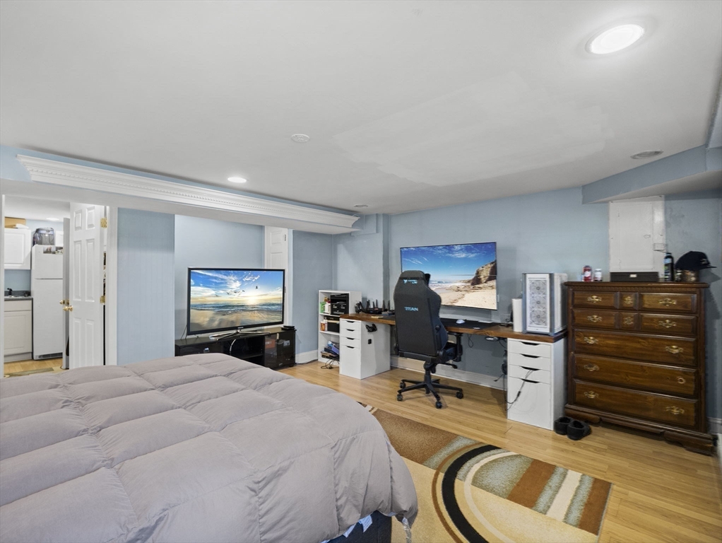 17 Cannongate Road, Unit 87 Tyngsborough, MA 01879 - Photo 29 of 39 a bed room with a bed and furniture