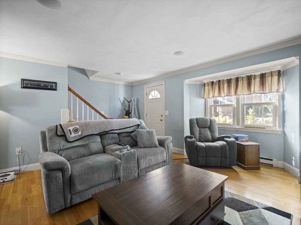 17 Cannongate Road, Unit 87 Tyngsborough, MA 01879 - Photo 3 of 39 a living room with furniture and a window