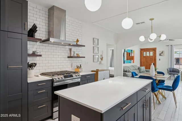 a kitchen that has a cabinets and a stove