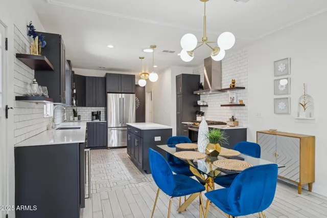 a view of kitchen with cabinets and wooden floor