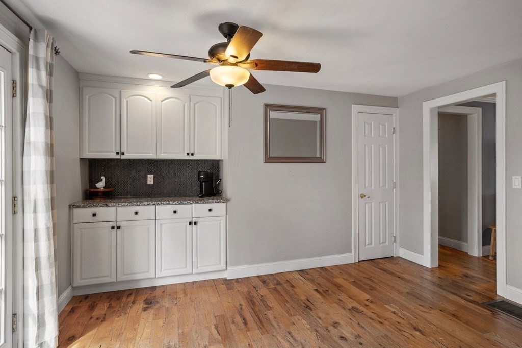 268 Forest Hills Road Springfield, MA 01128 - Photo 17 of 42 a view of kitchen with wooden floor ceiling fan and window