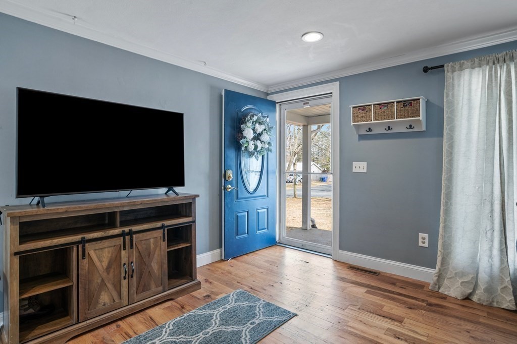 268 Forest Hills Road Springfield, MA 01128 - Photo 5 of 42 a living room with furniture and a flat screen tv