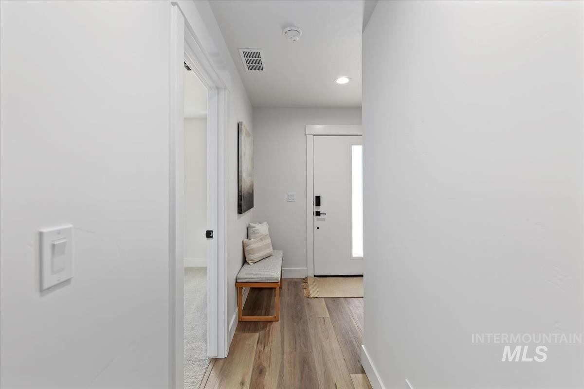 1725 South Rock View Lane, Unit 34 Boise, ID 83705 - Photo 13 of 31 Hallway featuring light wood-type flooring and recessed lighting