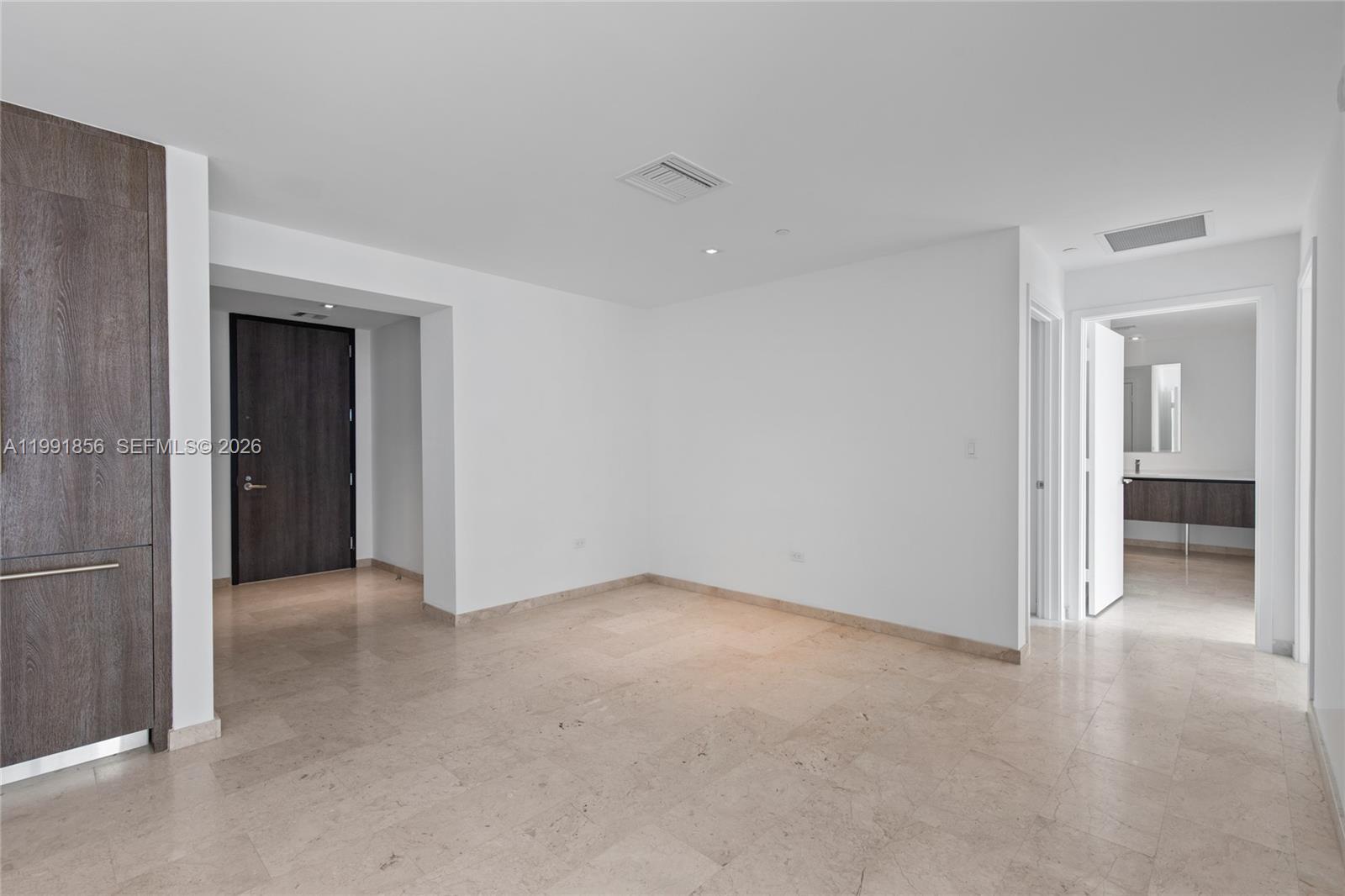 88 Southwest 7th Street, Unit 904 Miami, FL 33130 - Photo 8 of 26 a view of a big room with closet and a bathroom