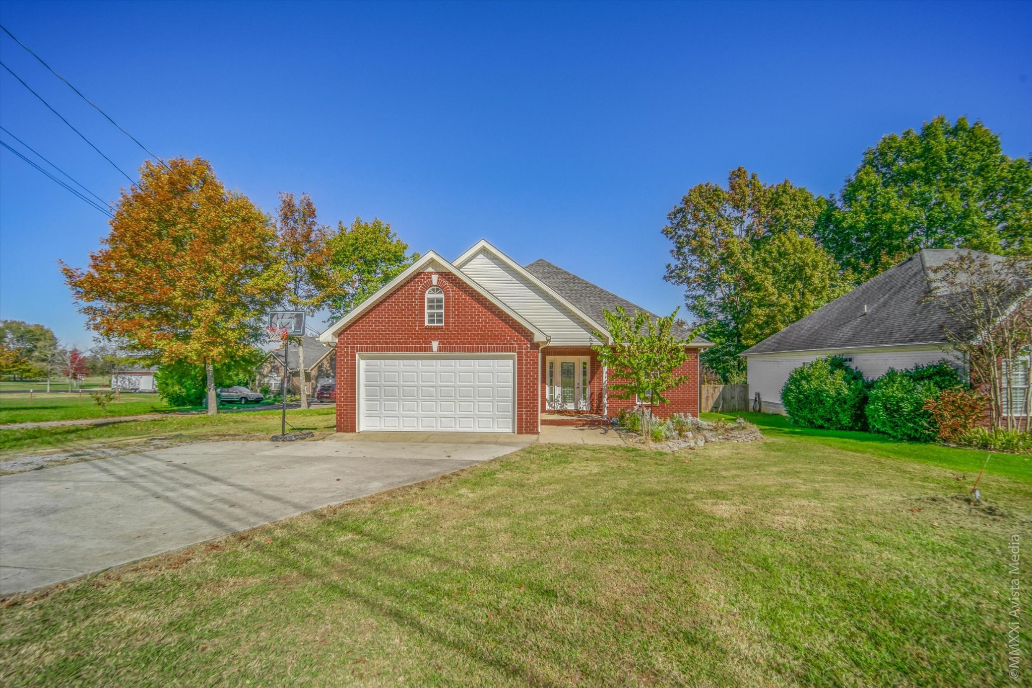 14908 Mt Pleasant Road Rockvale, TN 37153 - Photo 1 of 33 a front view of a house with a yard and garage